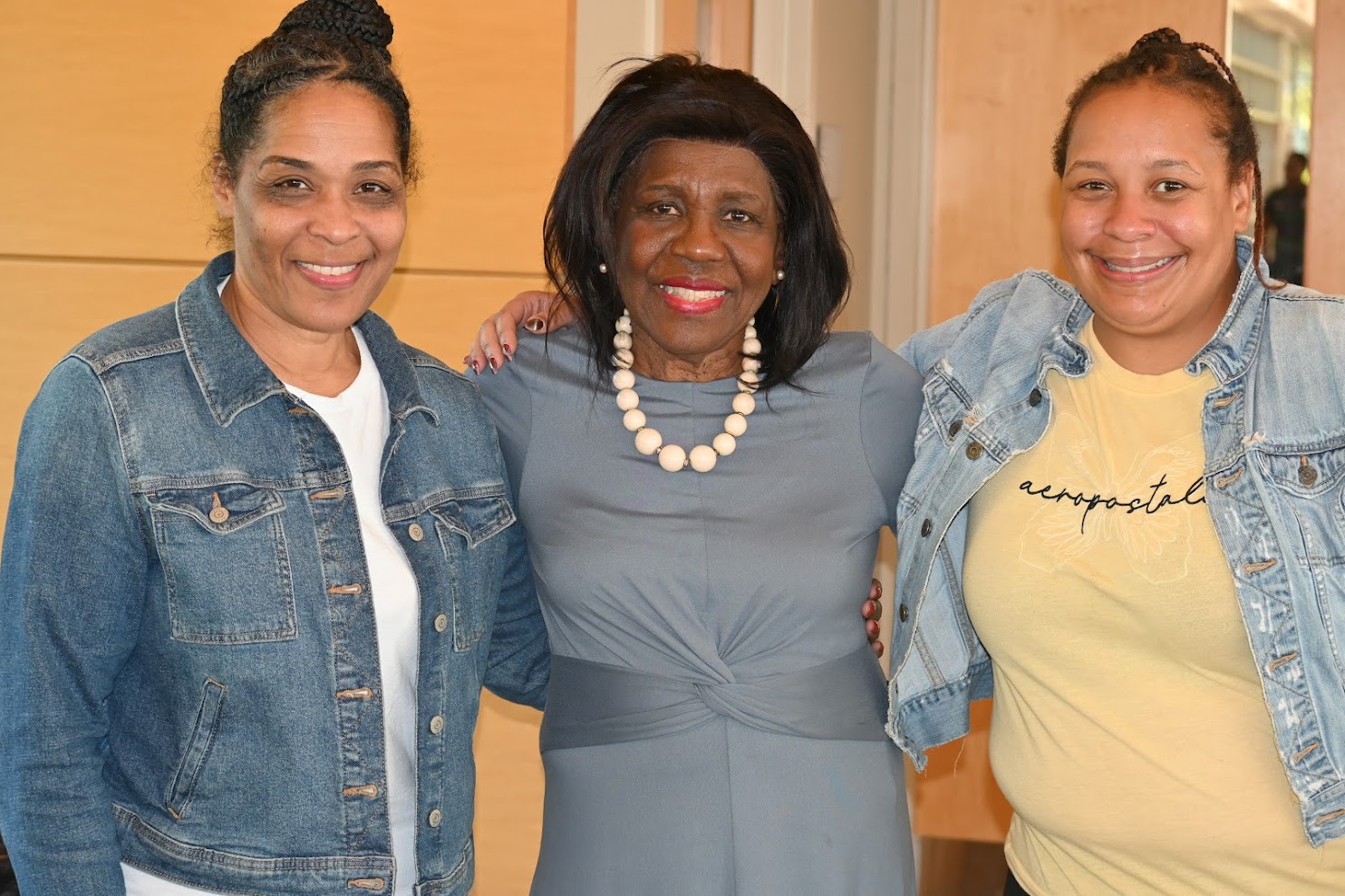 Others taking a picture with Joan